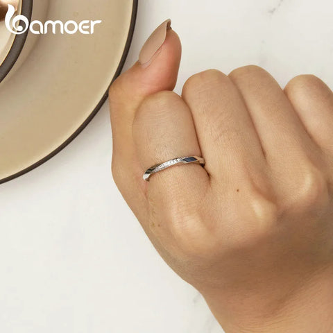 BAMOER 14K White Gold Plated Cubic Zirconia Twisted Mobius Eternity Band for Women, 925 Sterling Silver Engagement Wedding Ring