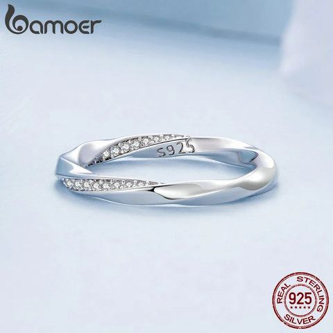 BAMOER 14K White Gold Plated Cubic Zirconia Twisted Mobius Eternity Band for Women, 925 Sterling Silver Engagement Wedding Ring